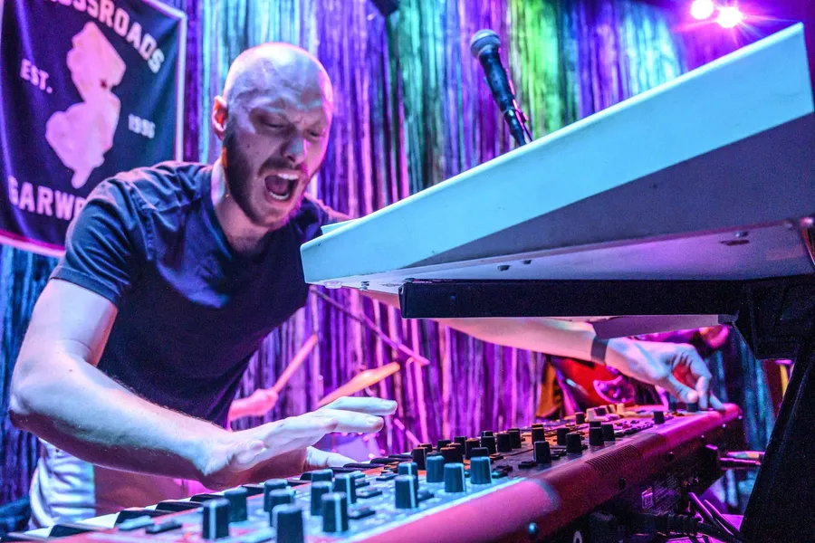 Ryan Gavin playing keyboards at Crossroads